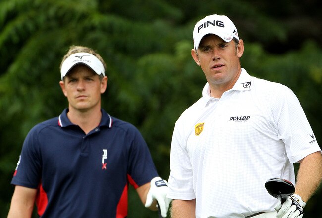 BETHESDA, MD - JUNE 16:  (L-R) Luke Donald of England and Lee Westwood of England look on from the 16th tee during the first round of the 111th U.S. Open at Congressional Country Club on June 16, 2011 in Bethesda, Maryland.  (Photo by Jamie Squire/Getty Images)