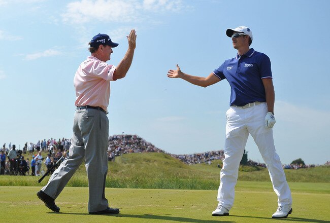 SANDWICH, ENGLAND - JULY 15:  Tom Watson (L) of the USA celebrates a hole in one on the 6th hole with  Henrik Stenson of Sweden during the second round of The 140th Open Championship at Royal St George's on July 15, 2011 in Sandwich, England.  (Photo by Stuart Franklin/Getty Images)