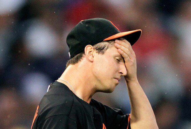 BOSTON, MA - JULY 8:  Zach Britton #53 of the Baltimore Orioles reacts in the first inning against the Boston Red Sox at Fenway Park on July 8, 2011 in Boston, Massachusetts.  (Photo by Jim Rogash/Getty Images)