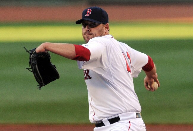 BOSTON, MA - JULY 09:  John Lackey #41 of the Boston Red Sox throws a pitch in the first inning against the Baltimore Orioles at Fenway Park on July 9, 2011 in Boston, Massachusetts. The Boston Red Sox won the game 4-0.  (Photo by Darren McCollester/Getty Images)