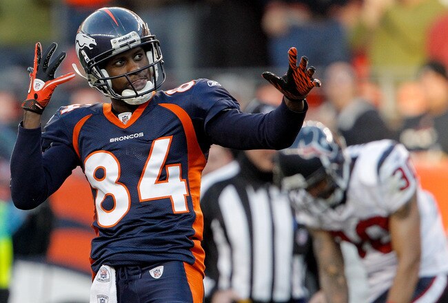 DENVER - DECEMBER 26:  Wide receiver Brandon Lloyd #84 of the Denver Broncos celebrates after a 41-yard reception against corner back Jason Allen #30 of the Houston Texans during the third quarter at INVESCO Field at Mile High on December 26, 2010 in Denver, Colorado.  The Denver Broncos defeated the Houston Texans 24-23. (Photo by Justin Edmonds/Getty Images)