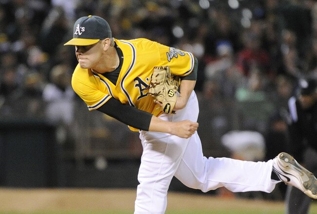 OAKLAND, CA -  JUNE 17: Andrew Bailey #40 of the Oakland Athletics pitches in the ninth inning against the San Francisco Giants during a MLB baseball game June 17, 2011 at the Oakland-Alameda County Coliseum in Oakland, California. The Athletics won the game 5-2. (Photo by Thearon W. Henderson/Getty Images)