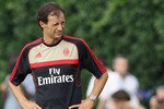 SOLBIATE ARNO, ITALY - JULY 12: Massimiliano Allegri (L) and Alessandro Nesta (R) in action during a training session at Milanello on July 12, 2011 in Solbiate Arno, Italy.  (Photo by Vittorio Zunino Celotto/Getty Images)