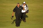 SANDWICH, ENGLAND - JULY 16:  Darren Clarke of Northern Ireland acknowledges the crowd on the 18th green during the third round of The 140th Open Championship at Royal St George's on July 16, 2011 in Sandwich, England.  (Photo by Scott Halleran/Getty Images)