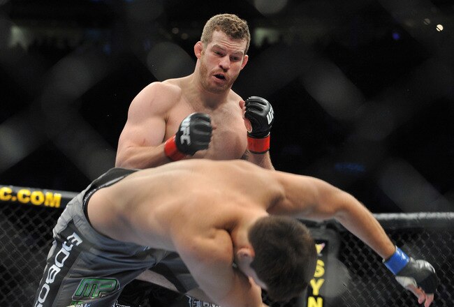 PORTLAND, OR - AUGUST 29:  UFC fighter Nate Marquardt (L) knocks out UFC fighter Demian Maia (R) during their Middleweight bout at UFC 102:  Couture vs. Nogueira at the Rose Garden Arena on August 29, 2009 in Portland, Oregon.  (Photo by Jon Kopaloff/Getty Images)