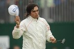 SANDWICH, ENGLAND - JULY 16:  Rickie Fowler of the United States acknowledges the crowd on the 18th hole during the third round of The 140th Open Championship at Royal St George's on July 16, 2011 in Sandwich, England.  (Photo by Ross Kinnaird/Getty Images)