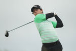 SANDWICH, ENGLAND - JULY 16:  Rory McIlroy of Northern Ireland hits a tee shot during the third round of The 140th Open Championship at Royal St George's on July 16, 2011 in Sandwich, England.  (Photo by Ross Kinnaird/Getty Images)
