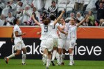 MOENCHENGLADBACH, GERMANY - JULY 13:  Alex Morgan (2nd of right) of USA celebrates after she scores her team's 3rd goal during the FIFA Women's World Cup 2011 Semi Final match between France and USA at Borussia-Park on July 13, 2011 in Moenchengladbach, Germany.  (Photo by Martin Rose/Getty Images)