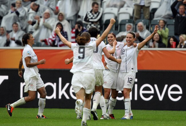 MOENCHENGLADBACH, GERMANY - JULY 13:  Alex Morgan (2nd of right) of USA celebrates after she scores her team's 3rd goal during the FIFA Women's World Cup 2011 Semi Final match between France and USA at Borussia-Park on July 13, 2011 in Moenchengladbach, Germany.  (Photo by Martin Rose/Getty Images)