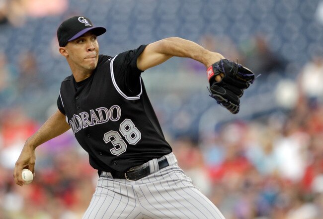 WASHINGTON, DC - JULY 09:  Starting pitcher Ubaldo Jimenez #38 of the Colorado Rockies delivers to a Washington Nationals batter during the third inning at Nationals Park on July 9, 2011 in Washington, DC.  (Photo by Rob Carr/Getty Images)