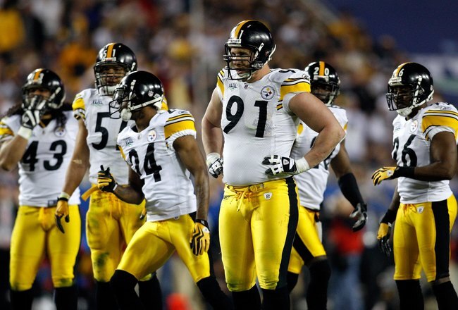 TAMPA, FL - FEBRUARY 01:  (L-R) Troy Polamalu #43, James Farrior #51, Ike Tayloer #24, Aaron Smith #91, Bryant McFadden #20 and Deshea Townsend #26 of the Pittsburgh Steelers get into position on defense against the Arizona Cardinals during Super Bowl XLIII on February 1, 2009 at Raymond James Stadium in Tampa, Florida. Steelers won 27-23. (Photo by Chris Graythen/Getty Images)