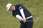 SANDWICH, ENGLAND - JULY 17:  Dustin Johnson of the United States hits an approach on the 5th hole during the final round of The 140th Open Championship at Royal St George's on July 17, 2011 in Sandwich, England.  (Photo by Andrew Redington/Getty Images)