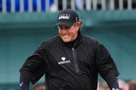SANDWICH, ENGLAND - JULY 17:  Phil Mickelson of the United States reacts to a missed putt on the 16th hole during the final round of The 140th Open Championship at Royal St George's on July 17, 2011 in Sandwich, England.  (Photo by Stuart Franklin/Getty Images)