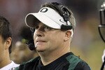 GLENDALE, AZ - JANUARY 10:  Head coach Chip Kelly of the Oregon Ducks looks on against the Auburn Tigers in the Tostitos BCS National Championship Game at University of Phoenix Stadium on January 10, 2011 in Glendale, Arizona.  (Photo by Ronald Martinez/Getty Images)