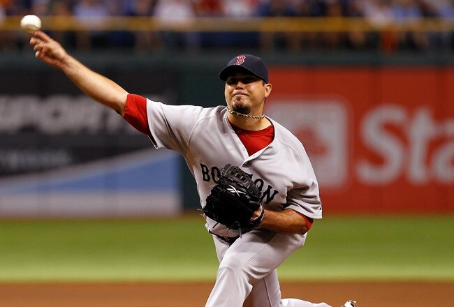 ST PETERSBURG, FL - JULY 17:  :  Pitcher Josh Beckett #33 of the Boston Red Sox pitches against the Tampa Bay Rays during the game at Tropicana Field on July 17, 2011 in St. Petersburg, Florida.  (Photo by J. Meric/Getty Images)