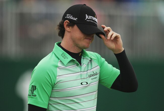 SANDWICH, ENGLAND - JULY 16:  Rory McIlroy of Northern Ireland reacts during the third round of The 140th Open Championship at Royal St George's on July 16, 2011 in Sandwich, England.  (Photo by Ross Kinnaird/Getty Images)