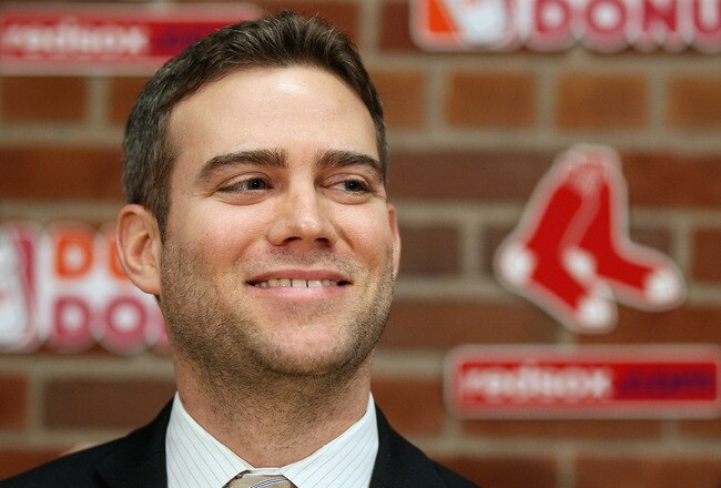 BOSTON, MA - DECEMBER 11:  Theo Epstein, general manager of the Boston Red Sox, answers questions about Carl Crawford during a press conference on December 11,  2010 at the Fenway Park in Boston, Massachusetts.  (Photo by Elsa/Getty Images)