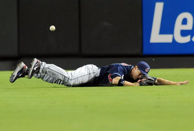 PHOENIX, AZ - JUNE 27:  Grady Sizemore #24 of the Cleveland Indians dives and misses a line drive that rolls to the fence against the Arizona Diamondbacks at Chase Field on June 27, 2011 in Phoenix, Arizona.  (Photo by Norm Hall/Getty Images)