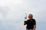 SANDWICH, ENGLAND - JULY 17:  Darren Clarke of Northern Ireland looks at the Claret Jug following his victory at the end of the final round of The 140th Open Championship at Royal St George's on July 17, 2011 in Sandwich, England.  (Photo by Streeter Lecka/Getty Images)