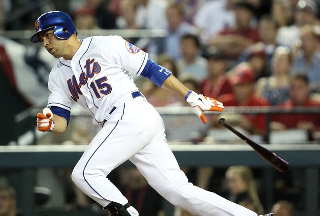 PHOENIX, AZ - JULY 12:  National League All-Star Carlos Beltran #15 of the New York Mets hits an infield single in the fourth inning of the 82nd MLB All-Star Game at Chase Field on July 12, 2011 in Phoenix, Arizona.  (Photo by Christian Petersen/Getty Images)