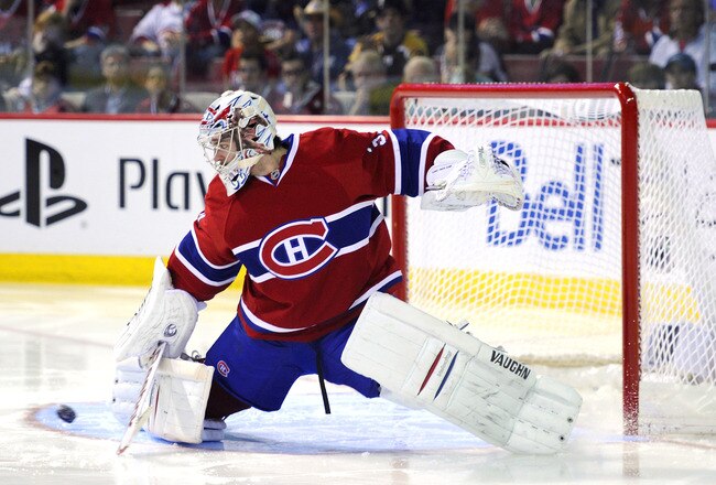 MONTREAL, CANADA - APRIL 26:  Carey Price #31 of the Montreal Canadiens kicks out a right pad save against the Boston Bruins in Game Six of the Eastern Conference Quarterfinals during the 2011 NHL Stanley Cup Playoffs at the Bell Centre on April 26, 2011 in Montreal, Canada.  (Photo by Phillip MacCallum/Getty Images)
