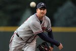 DENVER, CO - JULY 18:  Starting pitcher Derek Lowe #32 of the Atlanta Braves delivers against the Colorado Rockies at Coors Field on July 18, 2011 in Denver, Colorado.  (Photo by Doug Pensinger/Getty Images)