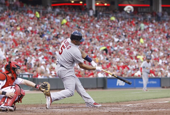 CINCINNATI, OH - JULY 16: Albert Pujols #5 of the St. Louis Cardinals hits a three-run home run in the fifth inning against the Cincinnati Reds at Great American Ball Park on July 16, 2011 in Cincinnati, Ohio. (Photo by Joe Robbins/Getty Images)