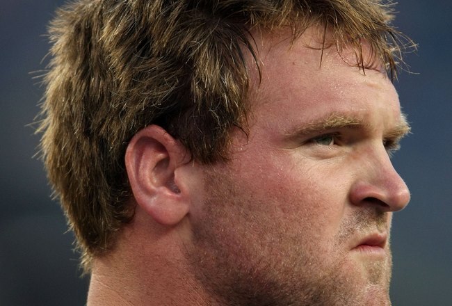 FOXBORO, MA - SEPTEMBER 03:  Logan Mankins #70 of the New England Patriots looks on before the game against the New York Giants on September 3, 2009 at Gillette Stadium in Foxboro, Massachusetts.  (Photo by Elsa/Getty Images)