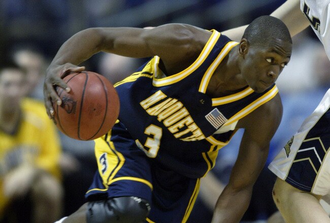 MINNEAPOLIS - MARCH 27:  Dwyane Wade #3 of the Marquette University Golden Eagles drives around Donatas Zavackas #5 of the University of Pittsburgh Panthers during the Midwest Regional of the NCAA Men's Basketball Championship at the Hubert H. Humphrey Metrodome on March 27, 2003 in Minneapolis, Minnesota.  The Golden Eagles won 77-74.  (Photo by Elsa/Getty Images)