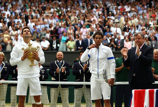 LONDON, ENGLAND - JULY 03:  Winner Novak Djokovic of Serbia (L) and runner-up Rafael Nadal of Spain with their trophies after their final round Gentlemen's match on Day Thirteen of the Wimbledon Lawn Tennis Championships at the All England Lawn Tennis and Croquet Club on July 3, 2011 in London, England.  (Photo by Clive Brunskill/Getty Images)