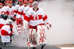 CHICAGO - JANUARY 01:  Goalie Ty Conklin #29 of the Detroit Red Wings leads his team out to the ice against the Chicago Blackhawks during the NHL Winter Classic at Wrigley Field on January 1, 2009 in Chicago, Illinois.  (Photo by Jamie Squire/Getty Images)