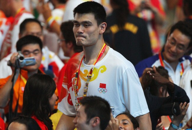 BEIJING - AUGUST 24:  Basketball player Yao Ming of China looks on during the Closing Ceremony for the Beijing 2008 Olympic Games at the National Stadium on August 24, 2008 in Beijing, China.  (Photo by Stu Forster/Getty Images)