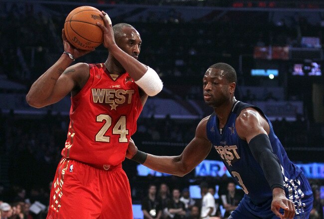 LOS ANGELES, CA - FEBRUARY 20:  Kobe Bryant #24 of the Los Angeles Lakers and the Western Conference is guarded byb Dwyane Wade #3 of the Miami Heat and the Eastern Conference in the 2011 NBA All-Star Game at Staples Center on February 20, 2011 in Los Angeles, California. NOTE TO USER: User expressly acknowledges and agrees that, by downloading and or using this photograph, User is consenting to the terms and conditions of the Getty Images License Agreement.  (Photo by Jeff Gross/Getty Images)