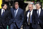 MINNEAPOLIS, MN - MAY 17: NFL lawyer Jeff Pash (L), NFL Commissioner Roger Goodell and Art Rooney II (R), president of the Pittsburgh Steelers arrive for court ordered mediation at the U.S. Courthouse on May 17, 2011 in Minneapolis, Minnesota. As the NFL lockout remains in place mediation was ordered after a hearing on an antitrust lawsuit filed by NFL players against the NFL owners after labor talks between the two broke down in March. (Photo by Hannah Foslien/Getty Images)