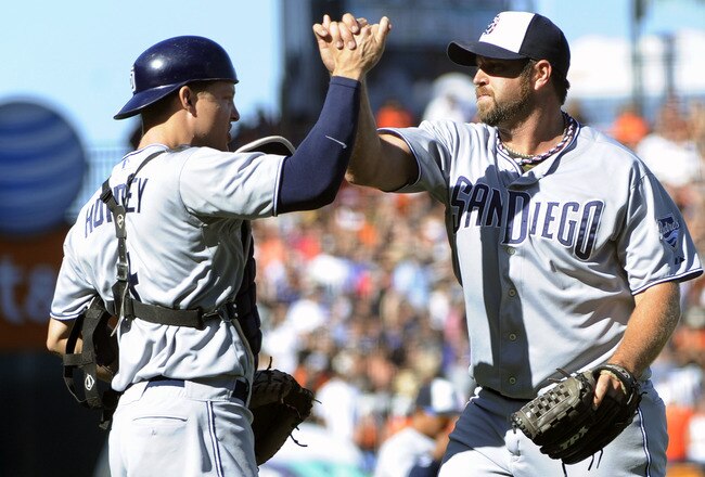 SAN FRANCISCO, CA - JULY 4: Heath Bell #21 and Nick Hundley #4 of the San Diego Padres celebrate defeating the San Francisco Giants 5 to 3 in a MLB baseball game at AT&T Park July 4, 2011 in San Francisco, California. (Photo by Thearon W. Henderson/Getty Images)