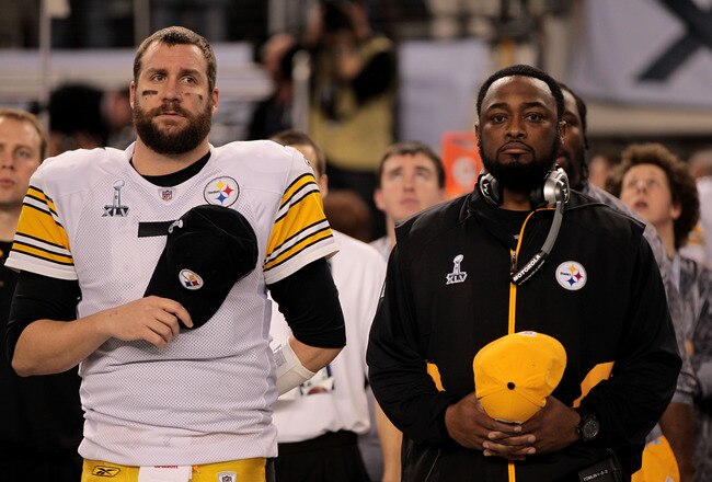 ARLINGTON, TX - FEBRUARY 06:  Ben Roethlisberger #7 and head coach Mike Tomlin of the Pittsburgh Steelers look on during the National Anthem during Super Bowl XLV at Cowboys Stadium on February 6, 2011 in Arlington, Texas.  (Photo by Jamie Squire/Getty Images)