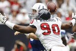 HOUSTON - SEPTEMBER 12:  Defensive end Mario Williams #90 of the Houston Texans applies pressure to quarterback Peyton Manning #18 of the Indianapolis Colts  during the NFL season opener at Reliant Stadium on September 12, 2010 in Houston, Texas.  (Photo by Bob Levey/Getty Images)