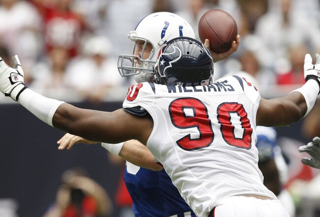 HOUSTON - SEPTEMBER 12:  Defensive end Mario Williams #90 of the Houston Texans applies pressure to quarterback Peyton Manning #18 of the Indianapolis Colts  during the NFL season opener at Reliant Stadium on September 12, 2010 in Houston, Texas.  (Photo by Bob Levey/Getty Images)