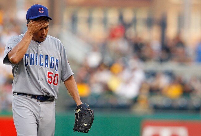 PITTSBURGH - JULY 08: Rodrigo Lopez #50 of the Chicago Cubs wipes the sweat off of his face in between pitches against  the Pittsburgh Pirates during the game on July 8, 2011 at PNC Park in Pittsburgh, Pennsylvania.  (Photo by Jared Wickerham/Getty Images)