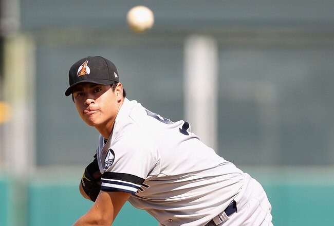 SCOTTSDALE, AZ - OCTOBER 23:  New York Yankees prospect Manuel Banuelos playing for the Phoenix Desert Dogs pitches against the Scottsdale Scorpions during the AZ Fall League game at Scottsdale Stadium on October 23, 2010 in Scottsdale, Arizona.  (Photo by Christian Petersen/Getty Images)