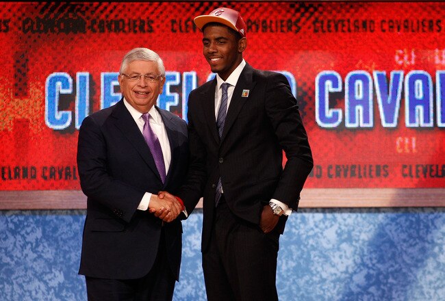 NEWARK, NJ - JUNE 23:  Kyrie Irving (R) from Duke greets NBA Commissioner David Stern after he was selected number one overall by the Cleveland Cavaliers in the first round during the 2011 NBA Draft at the Prudential Center on June 23, 2011 in Newark, New Jersey.  NOTE TO USER: User expressly acknowledges and agrees that, by downloading and/or using this Photograph, user is consenting to the terms and conditions of the Getty Images License Agreement.  (Photo by Mike Stobe/Getty Images)