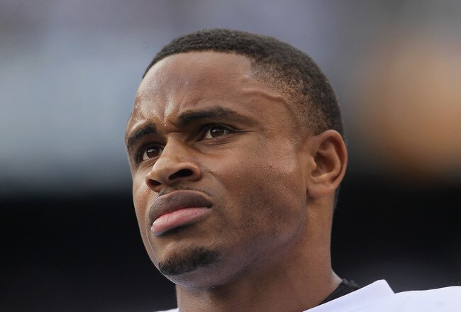 SAN DIEGO - DECEMBER 05:  Nnamdi Asomugha #21 the Oakland Raiders looks on from the sideline against the San Diego Chargers at Qualcomm Stadium on December 5, 2010 in San Diego, California. The Raiders defeated the Chargers 28-13.  (Photo by Jeff Gross/Getty Images)