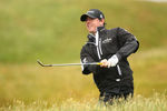 SANDWICH, ENGLAND - JULY 16:  Rory McIlroy of Northern Ireland  hits to the eighth green during the third round of The 140th Open Championship at Royal St George's on July 16, 2011 in Sandwich, England.  (Photo by Scott Halleran/Getty Images)