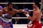 HAMBURG, GERMANY - JULY 02:  David Haye of England jabs Wladimir Klitschko of the Ukraine during their heavy weight unification match at the Imtech Arena on July 2, 2011 in Hamburg, Germany.  (Photo by Scott Heavey/Getty Images)