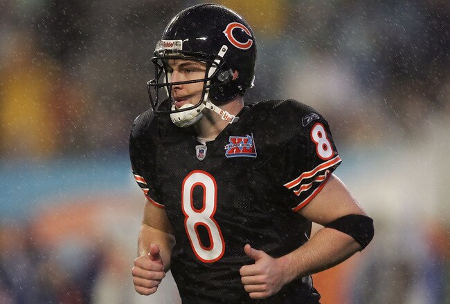 MIAMI GARDENS, FL - FEBRUARY 04:  Quarterback Rex Grossman #8 of the Chicago Bears runs off the field after Kelvin Hayden #26 of the Indianapolis Colts returned an interception 56-yards for a touchdown during the fourth quarter of Super Bowl XLI on February 4, 2007 at Dolphin Stadium in Miami Gardens, Florida.  (Photo by Jonathan Daniel/Getty Images)