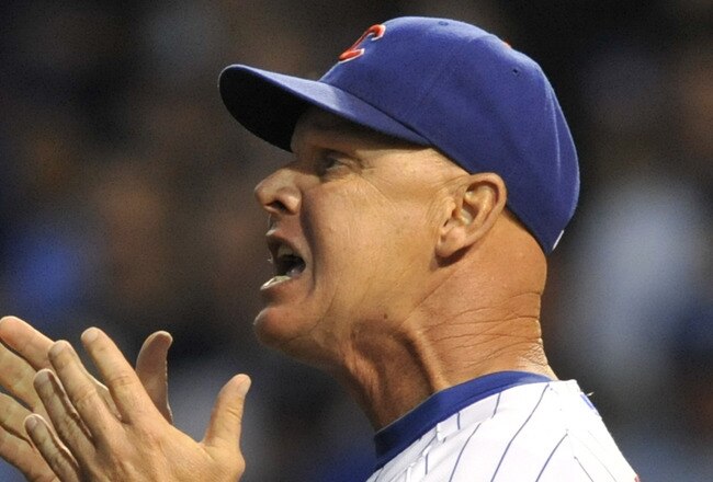 CHICAGO, IL - JUNE 28:  Mike Quade # 8 manager of the Chicago Cubs argues a call with home plate umpire Tim McClelland # 36 during a game against the San Francisco Giants in the fifth inning during the second game of a doubleheader  on June 28, 2011 at Wrigley Field in Chicago, Illinois.  (Photo by David Banks/Getty Images)