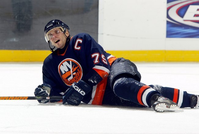 UNIONDALE, NY - APRIL 18:  Alexei Yashin #79 of the New York Islanders falls to the ice during Game 4 of the 2007 Eastern Conference Quarterfinals against the Buffalo Sabres on April 18, 2007 at Nassau Coliseum in Uniondale, New York.  The Sabres won the game 4-2 and lead the series 3-1.  (Photo by Jim McIsaac/Getty Images)