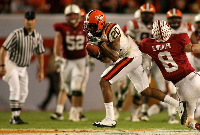 MIAMI, FL - JANUARY 03:  Jayron Hosley #20 of the Virginai Tech Hokies intercepts a pass in the second quarter against Ryan Whalen #8 of the Stanford Cardinal during the 2011 Discover Orange Bowl at Sun Life Stadium on January 3, 2011 in Miami, Florida.  (Photo by Marc Serota/Getty Images)