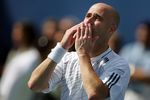 NEW YORK - SEPTEMBER 03:  Andre Agassi blows kisses to the crowd after being defeated by Benjamin Becker of Germany in four sets during the U.S. Open at the USTA Billie Jean King National Tennis Center in Flushing Meadows Corona Park on September 3, 2006 in the Flushing neighborhood of the Queens borough of New York City.  (Photo by Ezra Shaw/Getty Images)