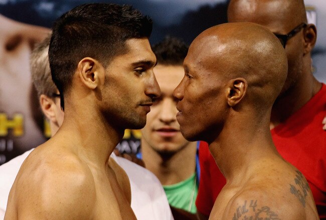 LAS VEGAS, NV - JULY 22:  Amir Khan (L) and Zab Judah during the weigh in to preview their Super Lightweight World Campionship Unification match at the Mandalay Bay Events Centre on July 22, 2011 in Las Vegas, Nevada.  (Photo by Scott Heavey/Getty Images)